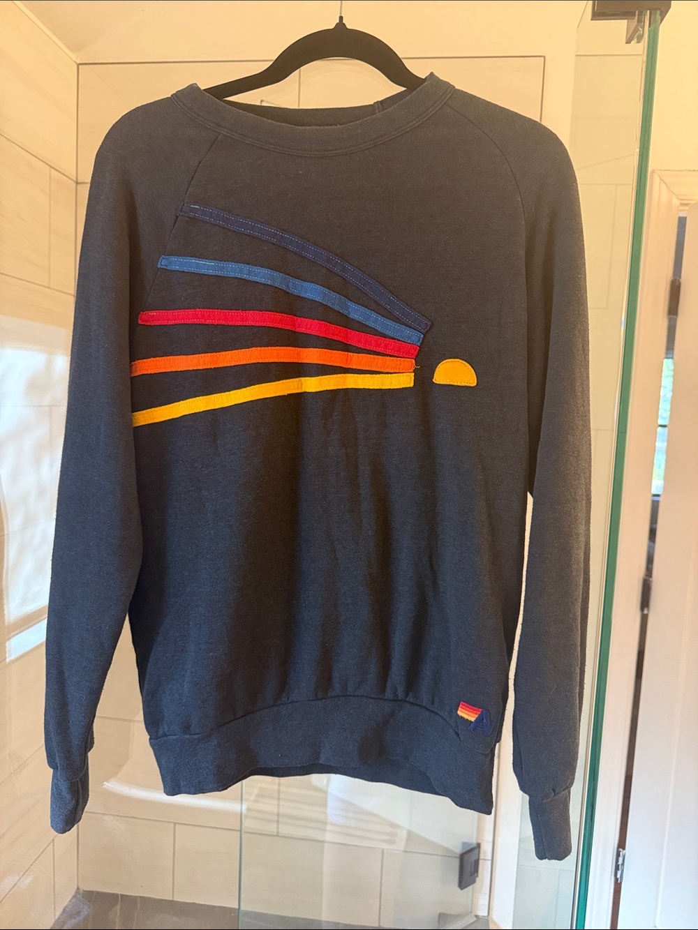 Aviator Nation Navy Crewneck with Red, Orange, Yellow & Blue Stripe Sun